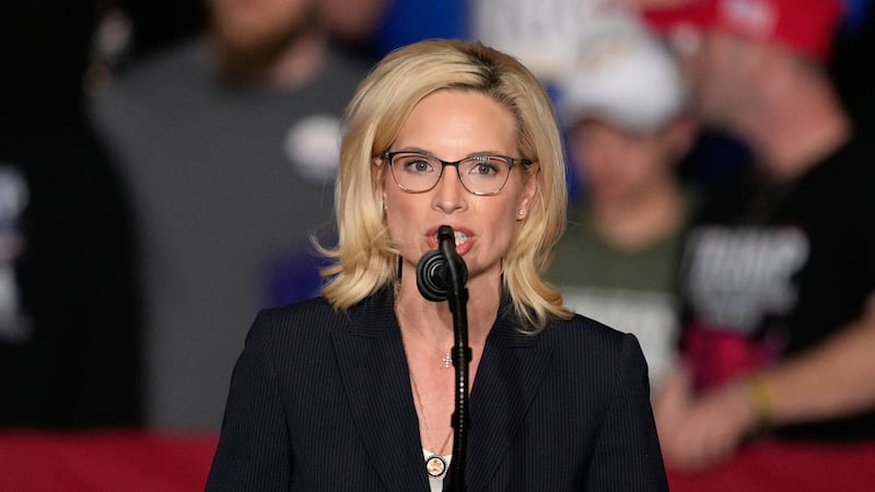 FILE - Rep. Ashley Hinson, R-Iowa, speaks before President Donald Trump arrives at a rally,...