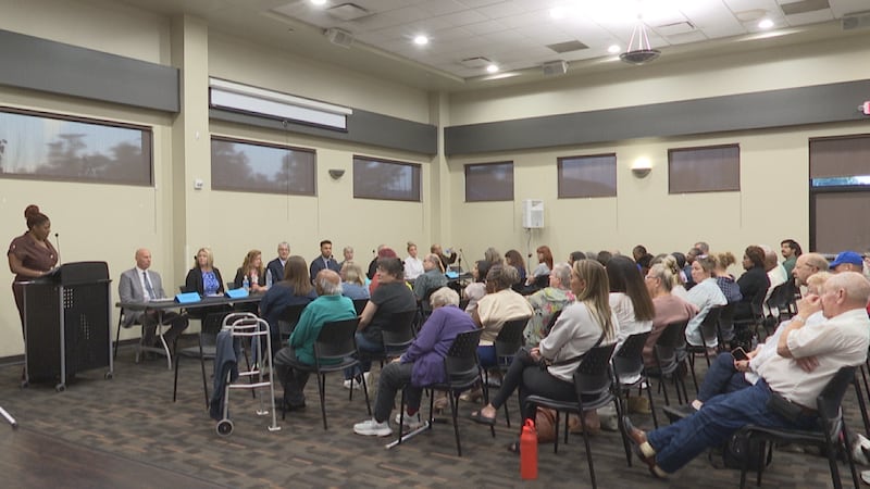 The crowd at the NAACP forum listens intently to the candidates who are running for office
