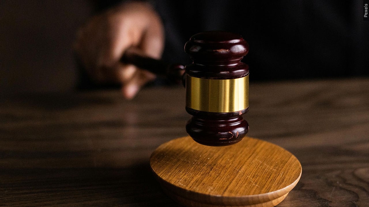 Moline woman sentenced to prison on wire fraud , identity theft charges