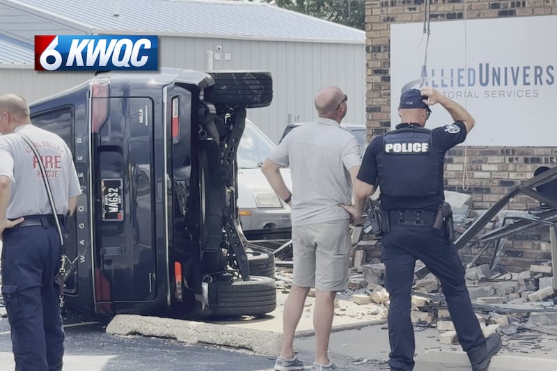 A SUV drive into Allied Universal Friday afternoon in Milan, Illinois.