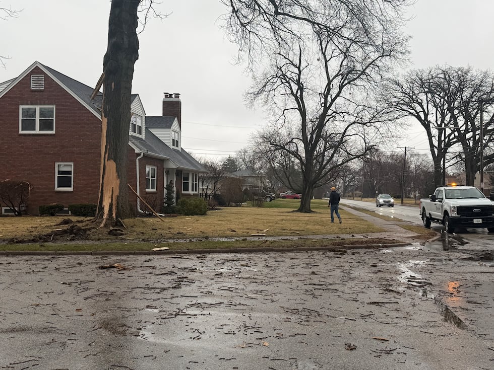 A KWQC crew could see debris in the road and sidewalk Sunday afternoon.