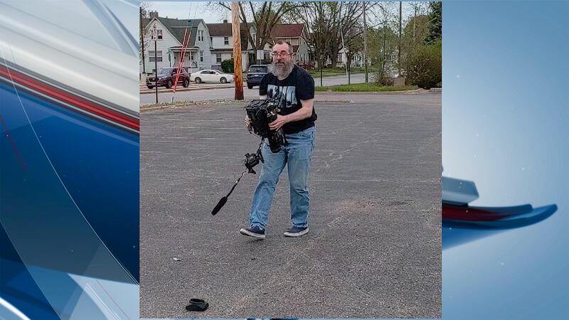 Police are looking for a person who attacked a local photojournalist. This is a still image of...