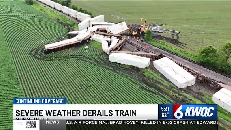 A train derailed near Monmouth after severe storms, scattering cars into farm fields and...